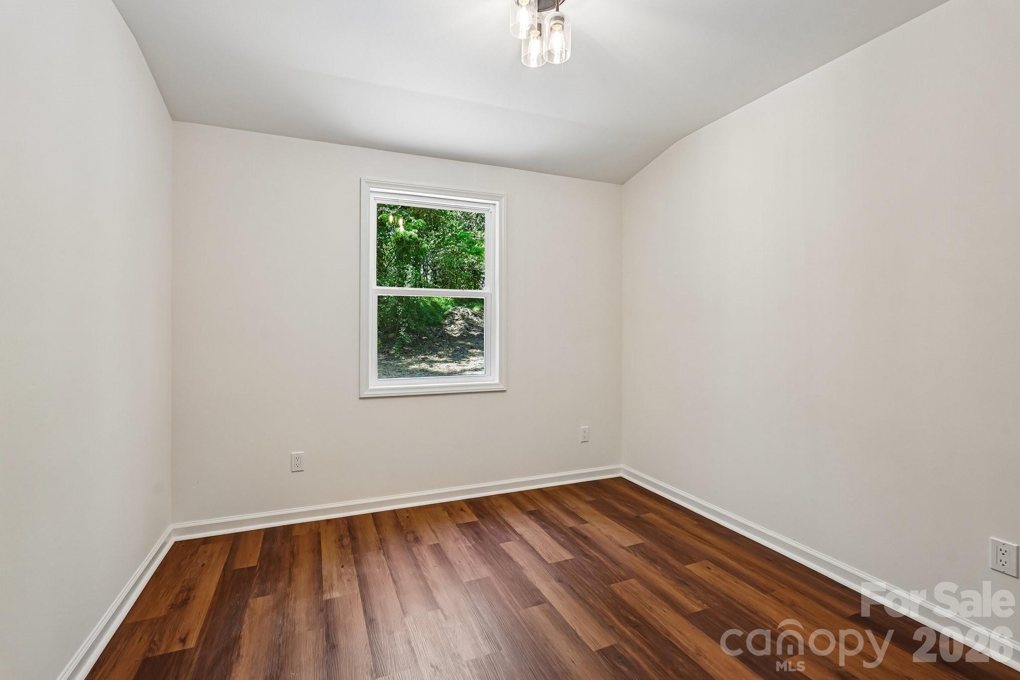 514 West Arch Street Lancaster, SC 29720 - Photo 29 of 43 an empty room with a window