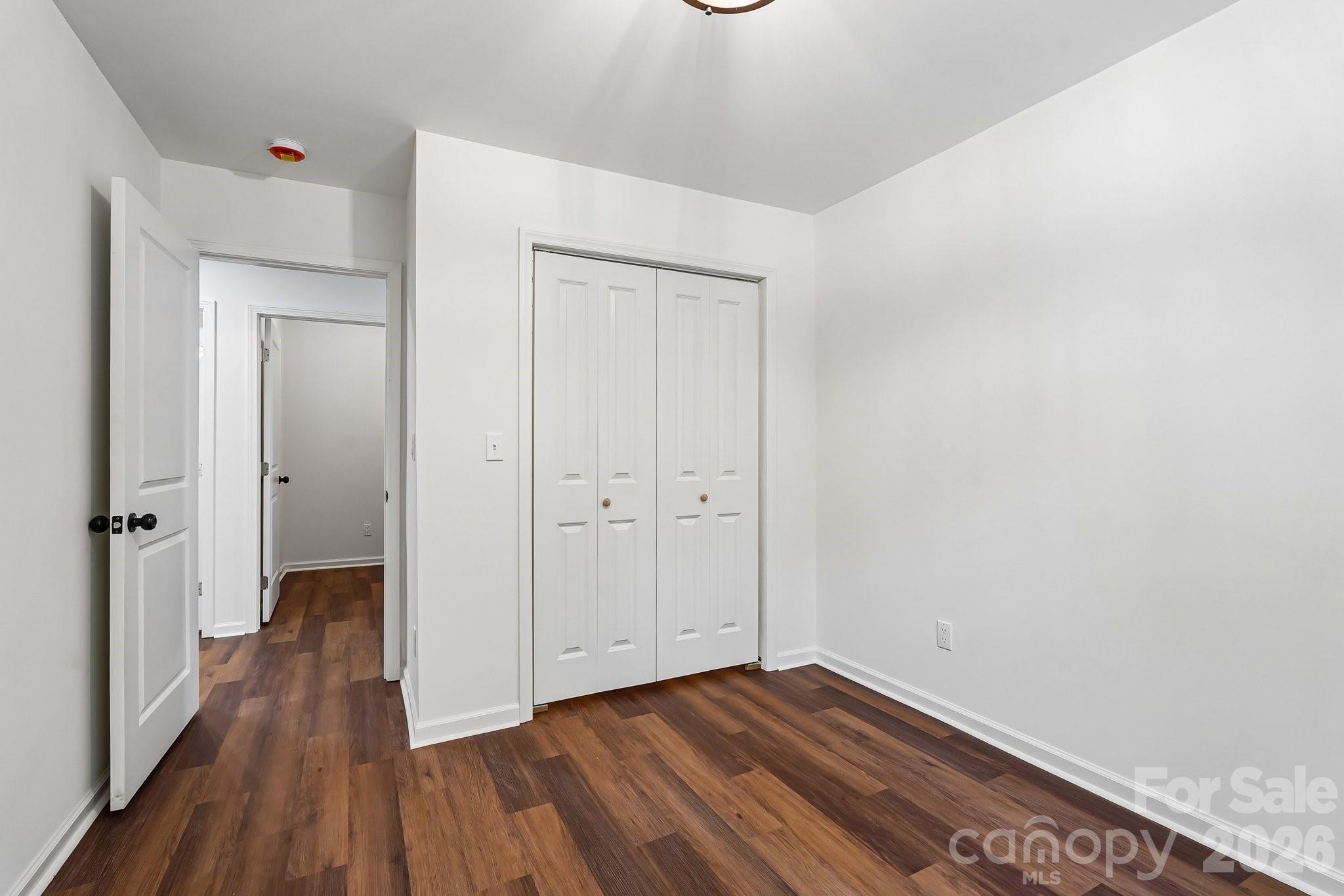 514 West Arch Street Lancaster, SC 29720 - Photo 34 of 43 a view of a hallway with wooden floor