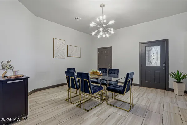 a bedroom with a bed and cabinets