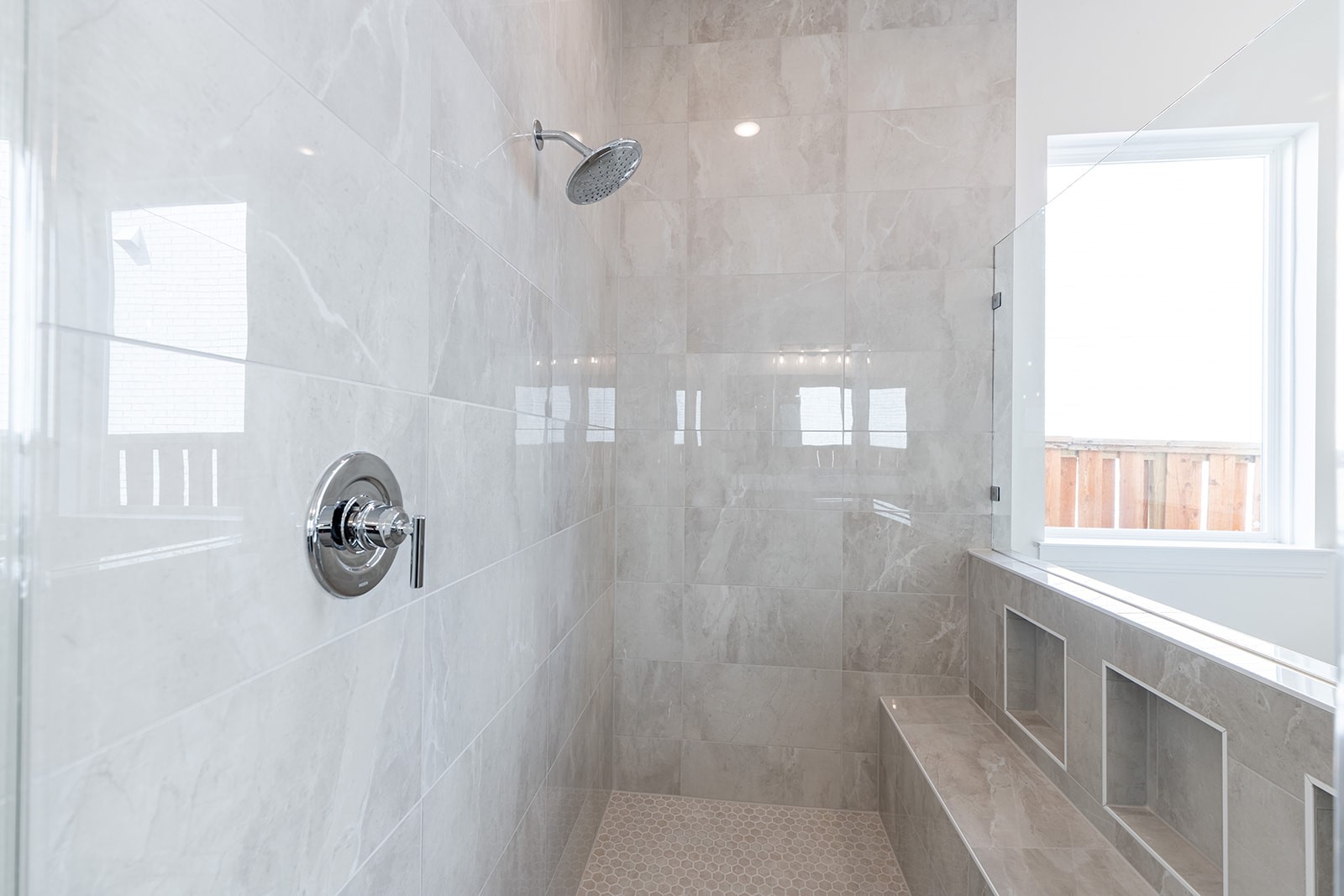 304 Barnstorm Lane Georgetown, TX 78633 - Photo 31 of 40 a bathroom with windows and a shower
