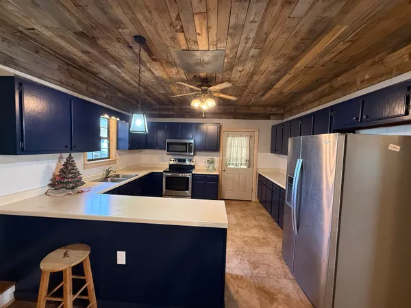 a bed room with a bed and a couch