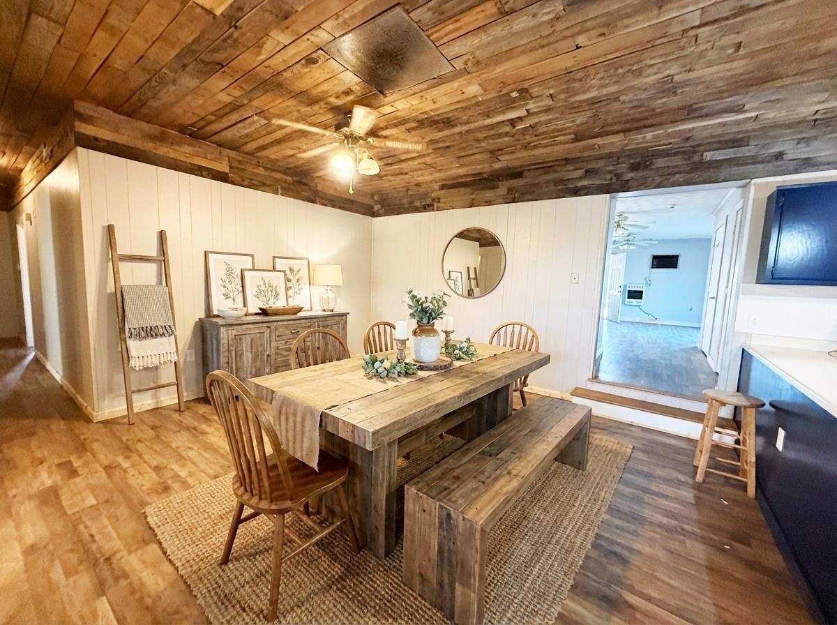 2142 Highway 70 Mason, TN 38049 - Photo 17 of 38 a view of a dining room with furniture and a chandelier