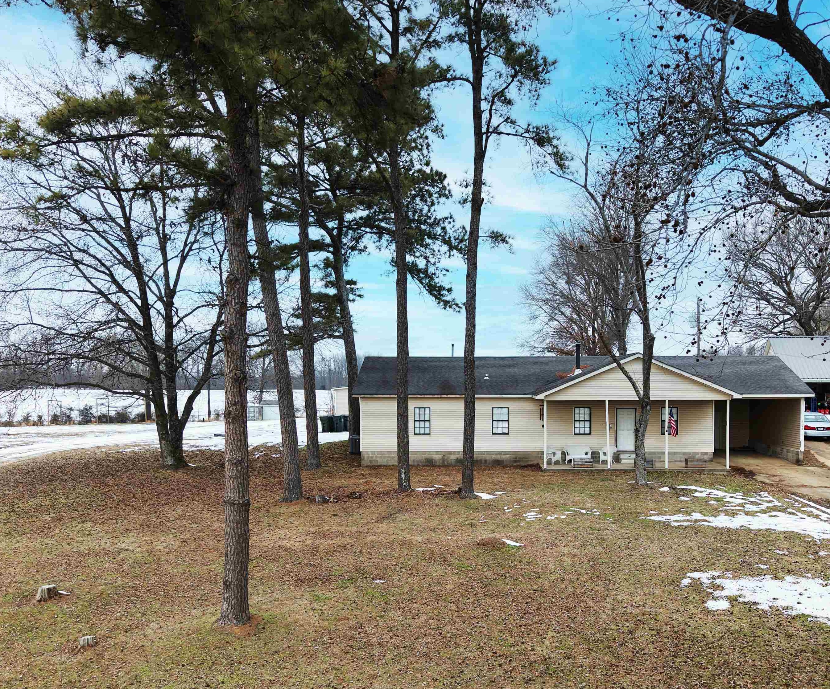2142 Highway 70 Mason, TN 38049 - Photo 5 of 36 View of front of property with a carport and driveway