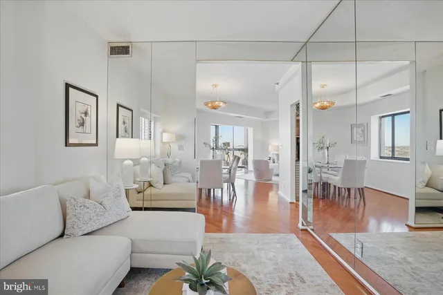 a kitchen with stainless steel appliances granite countertop a stove and a refrigerator