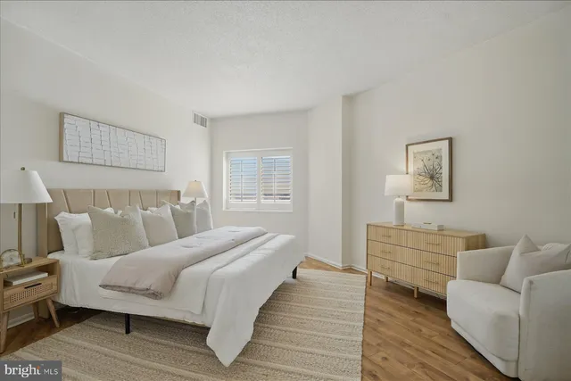 a bathroom with a double vanity sink and mirror