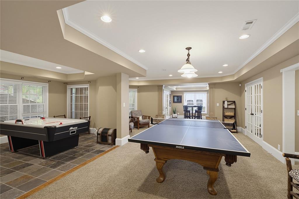 14442 Club Circle Milton, GA 30004 - Photo 48 of 82 a view of a dining room with furniture