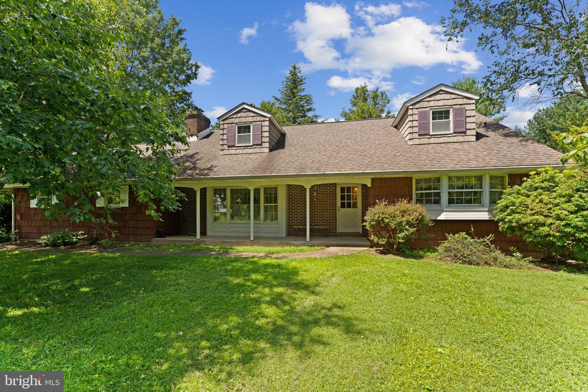 215 Bethel Road Spring City, PA 19475 - Photo 1 of 29 a front view of a house with a yard