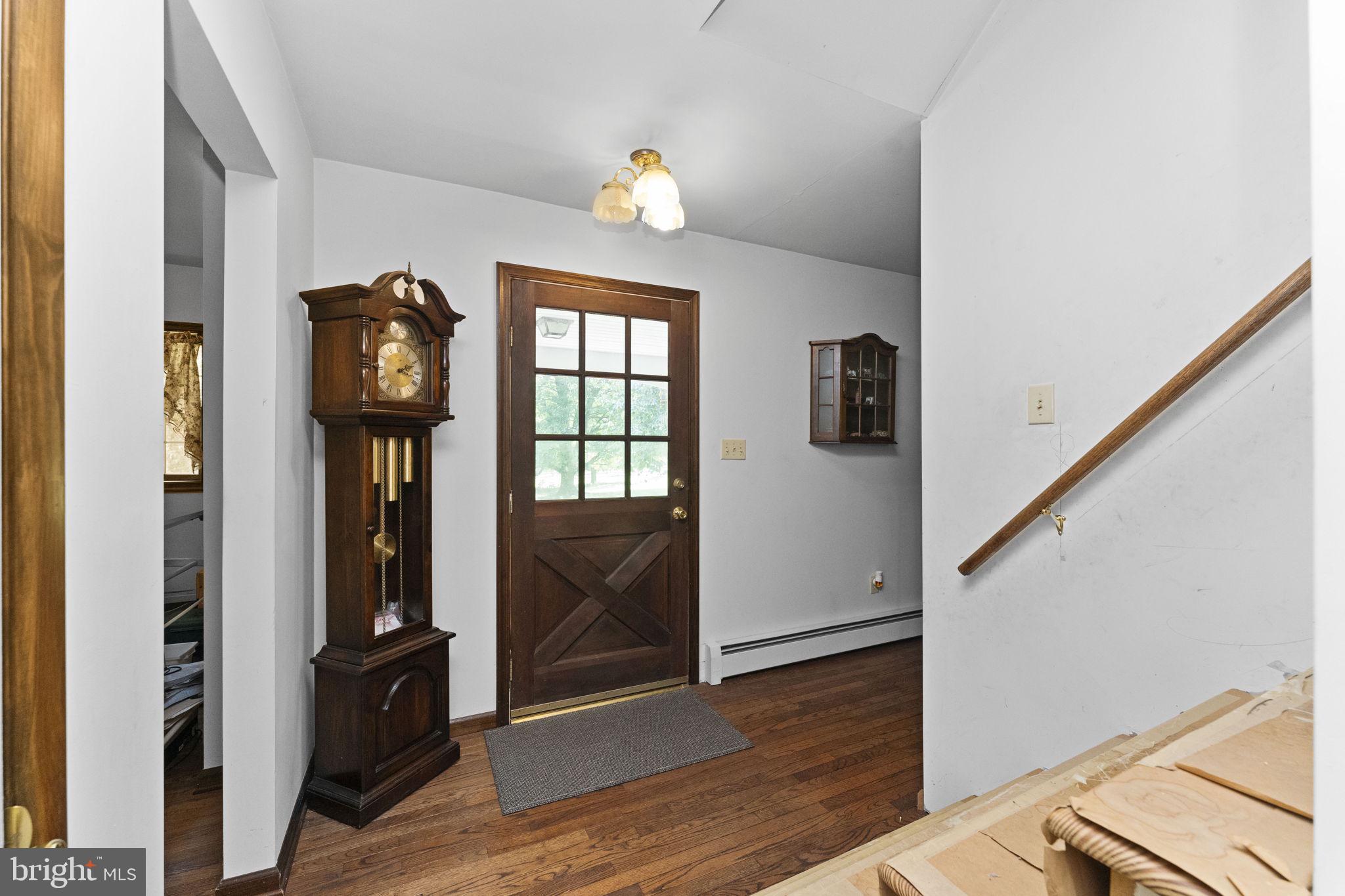 215 Bethel Road Spring City, PA 19475 - Photo 3 of 29 a view of an entryway with wooden floor