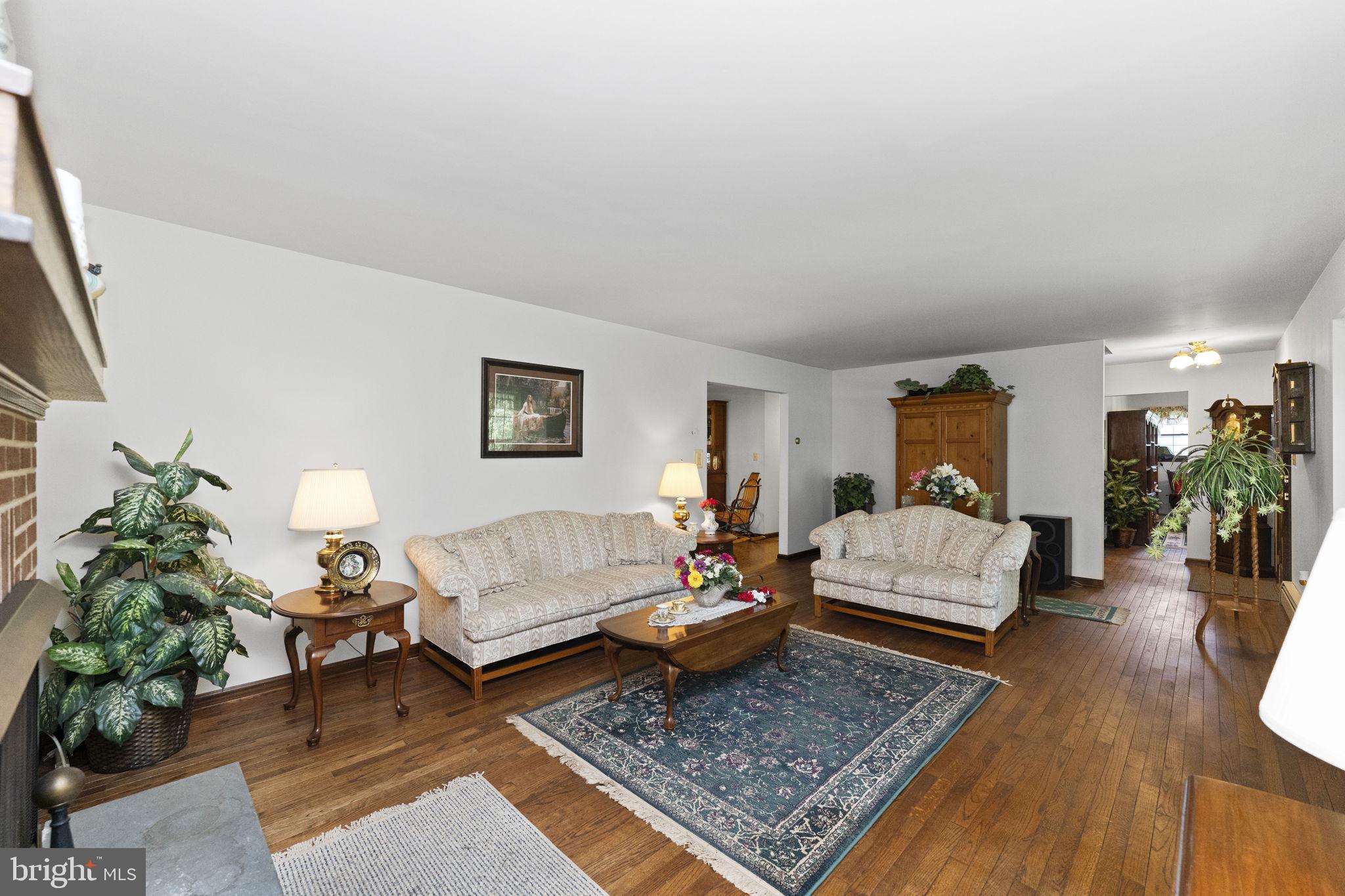 215 Bethel Road Spring City, PA 19475 - Photo 5 of 29 a living room with furniture and wooden floor