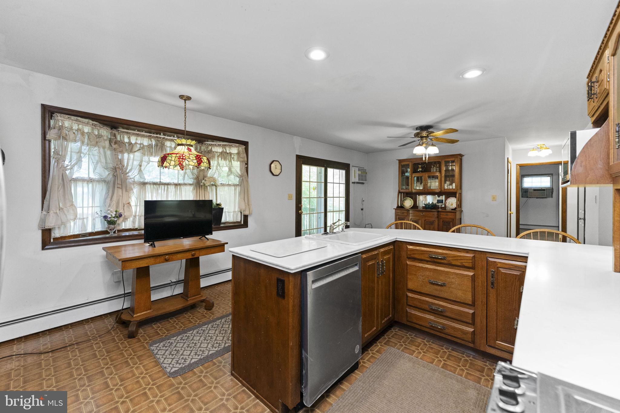 215 Bethel Road Spring City, PA 19475 - Photo 8 of 29 a kitchen that has a sink and a stove in it