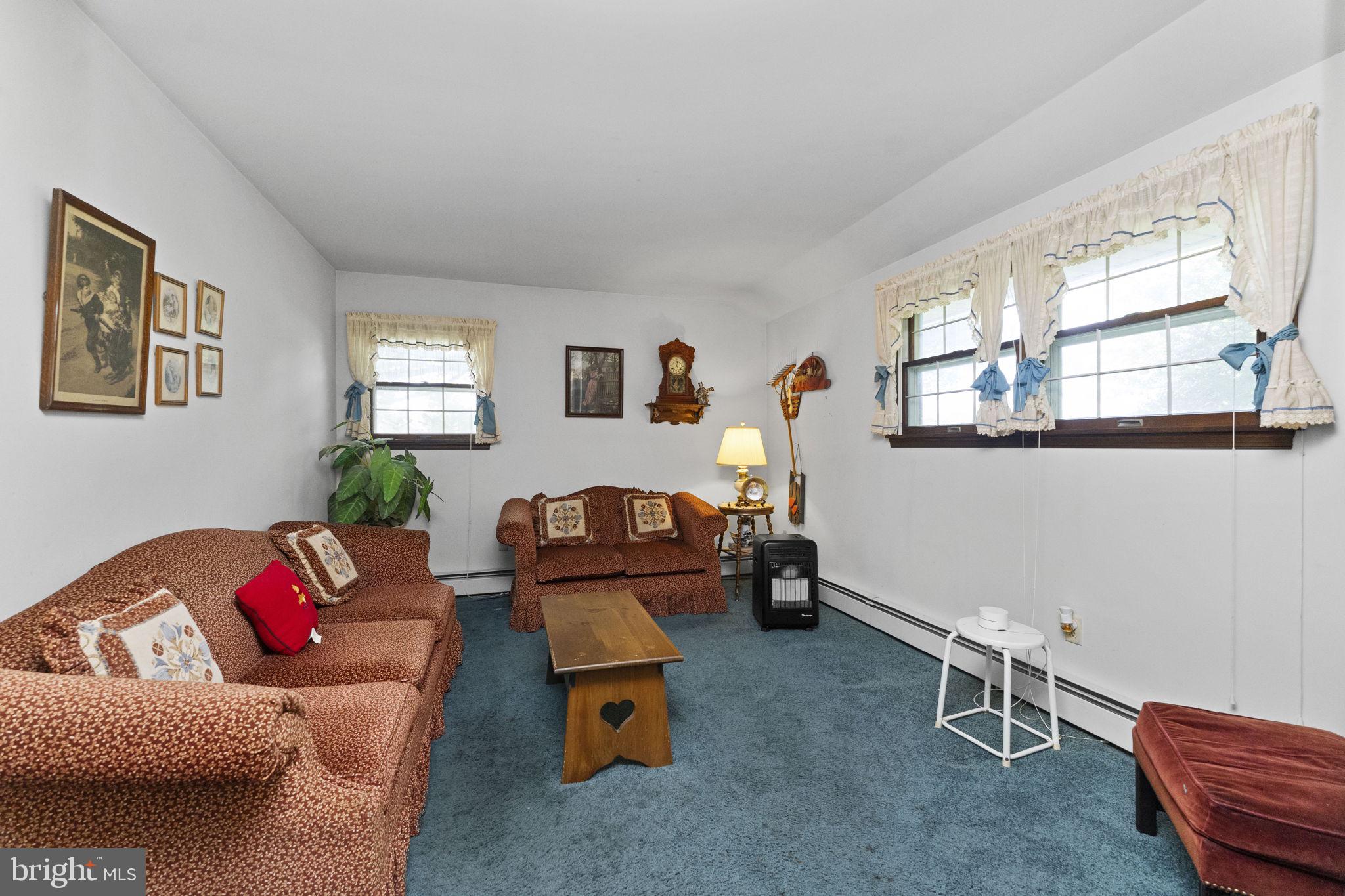 215 Bethel Road Spring City, PA 19475 - Photo 9 of 29 a living room with furniture and a window