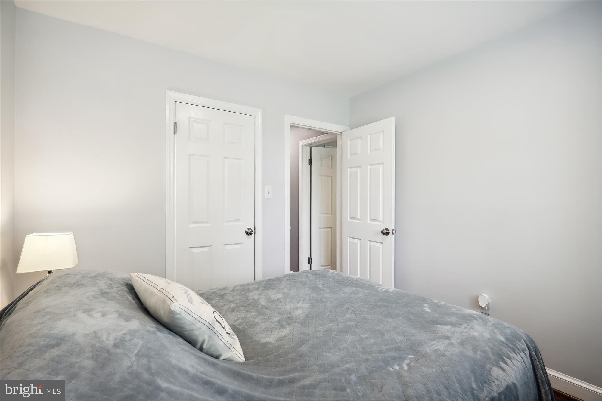 9805 Five Oaks Road Fairfax, VA 22031 - Photo 23 of 70 a bedroom with a bed and pillows