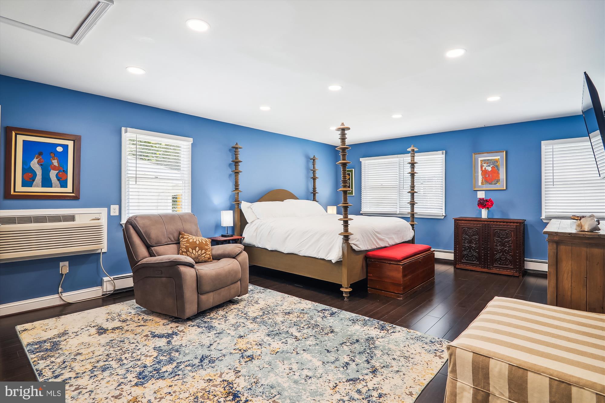 9805 Five Oaks Road Fairfax, VA 22031 - Photo 27 of 70 a bedroom with a bed and wooden floor