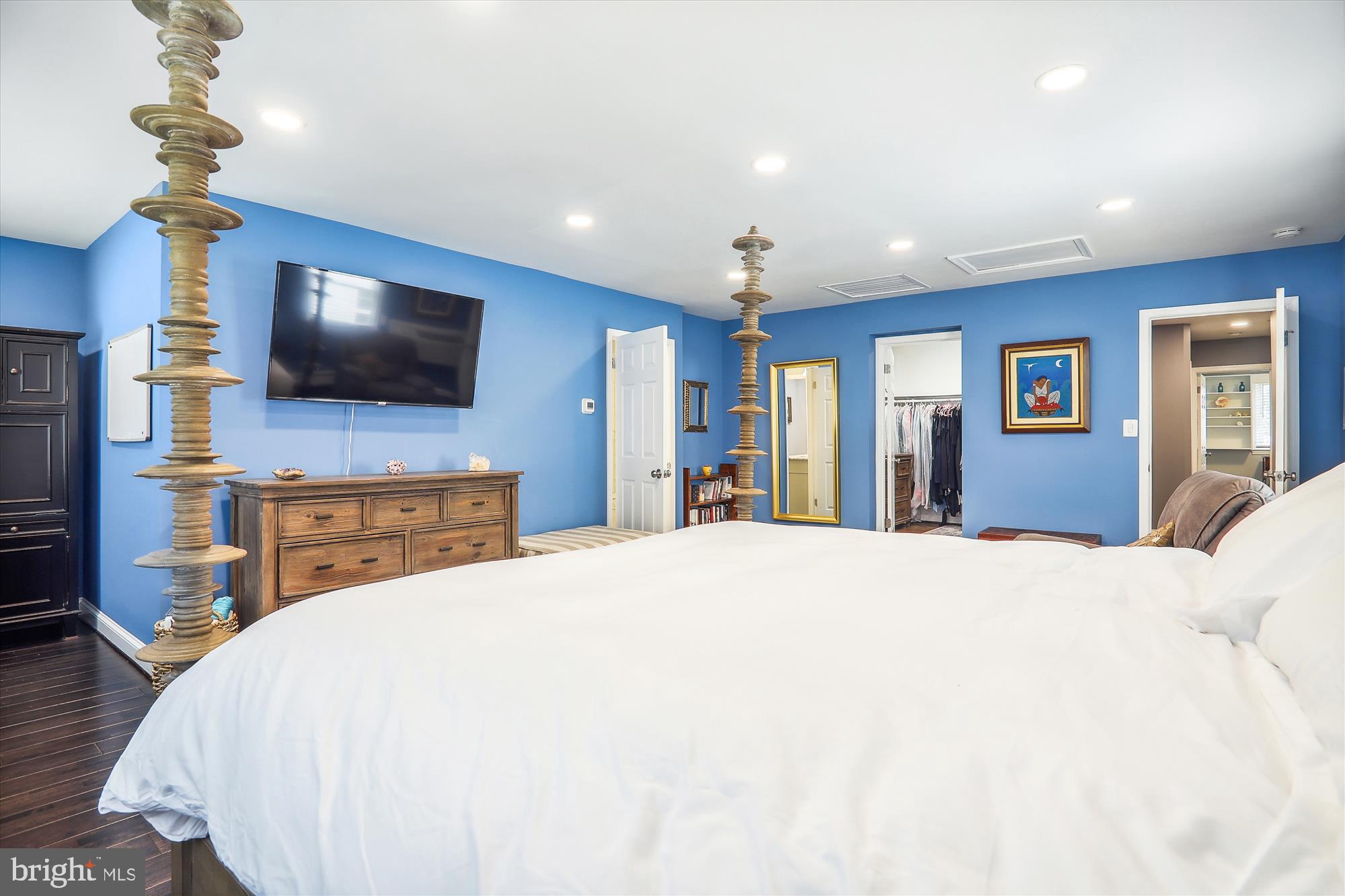 9805 Five Oaks Road Fairfax, VA 22031 - Photo 29 of 70 a bedroom with a bed and a flat screen tv
