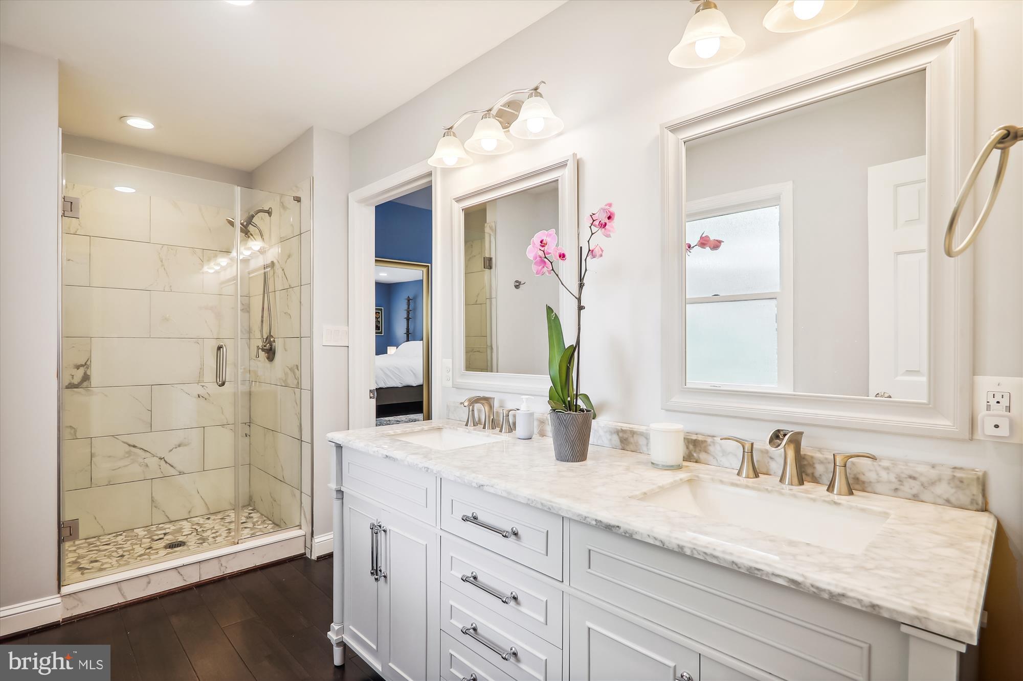 9805 Five Oaks Road Fairfax, VA 22031 - Photo 30 of 70 a bathroom with a granite countertop sink mirror and double