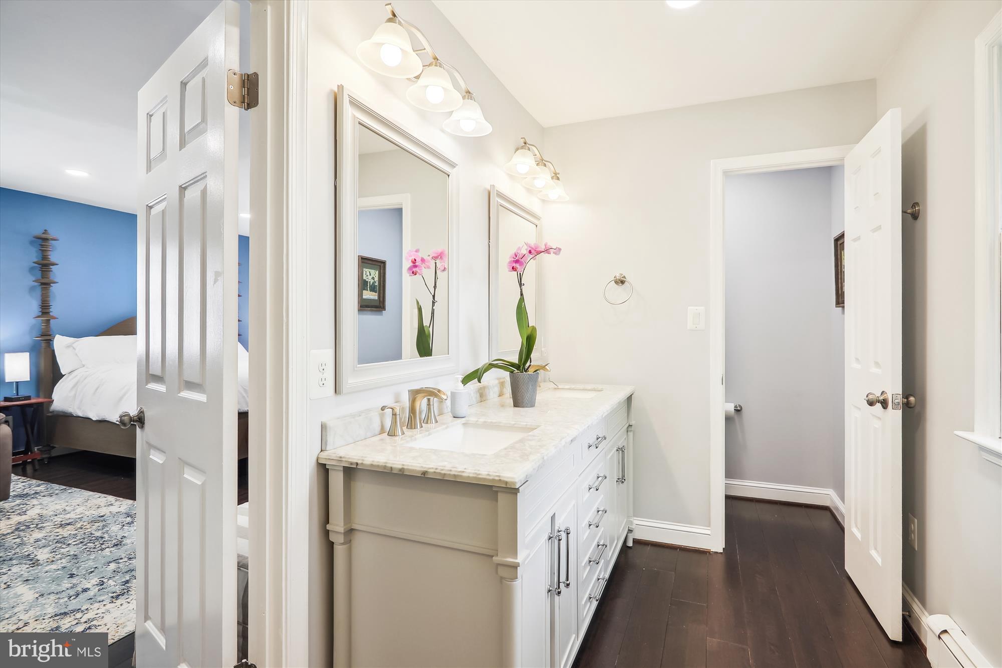 9805 Five Oaks Road Fairfax, VA 22031 - Photo 31 of 70 a bathroom with a sink vanity granite and a mirror