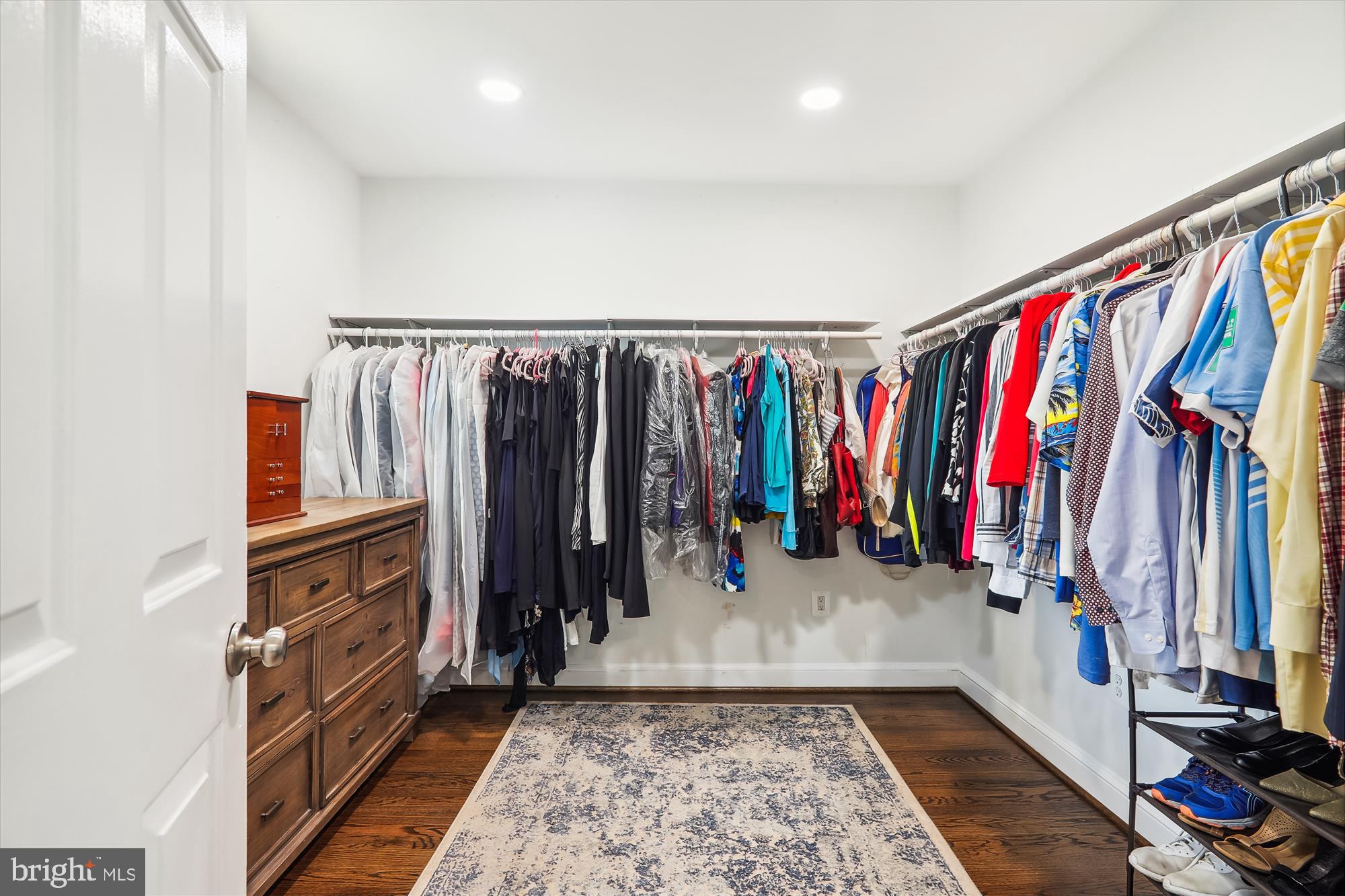 9805 Five Oaks Road Fairfax, VA 22031 - Photo 32 of 70 a view of walk in closet with clothes