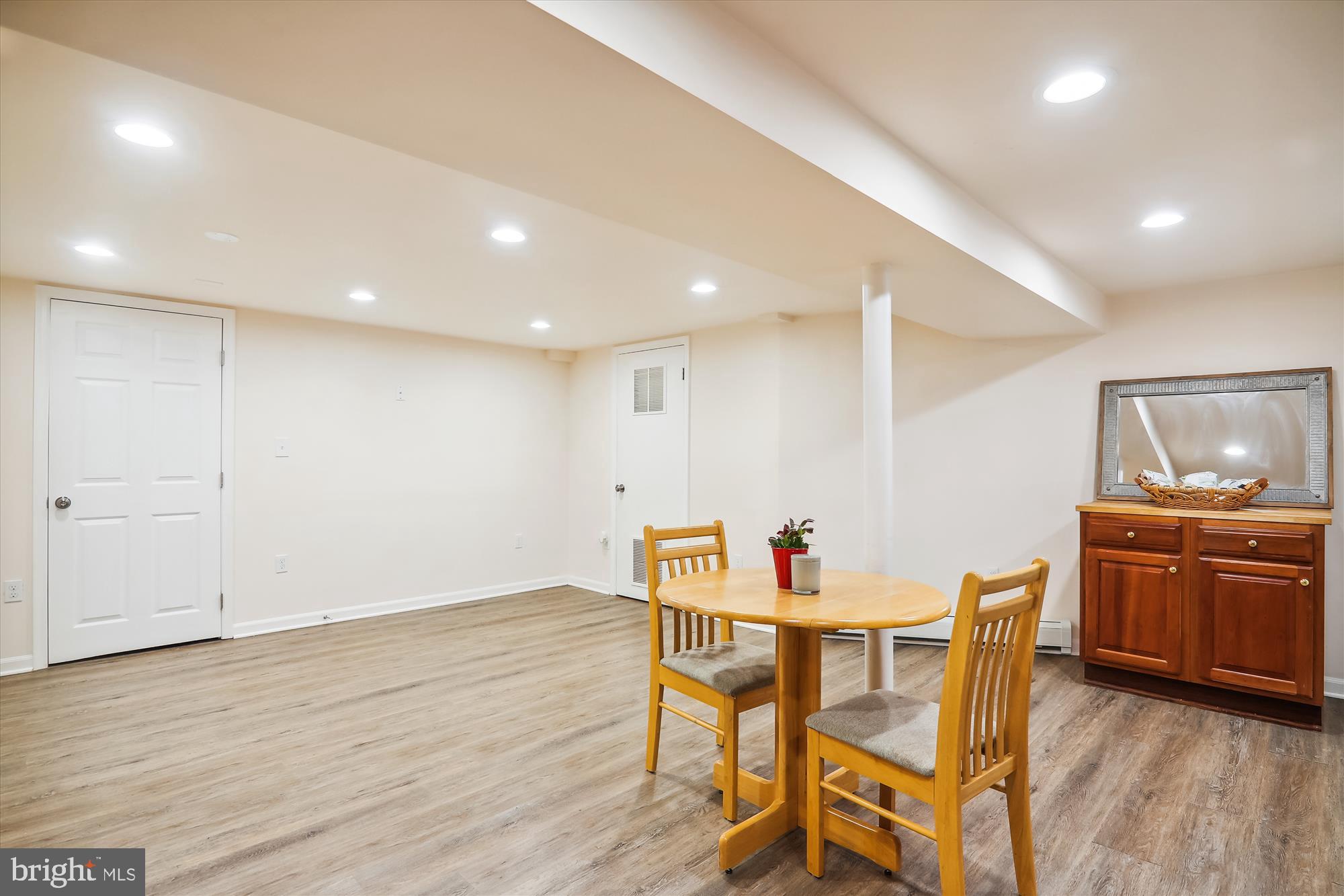 9805 Five Oaks Road Fairfax, VA 22031 - Photo 47 of 70 a view of a dining room with furniture and wooden floor