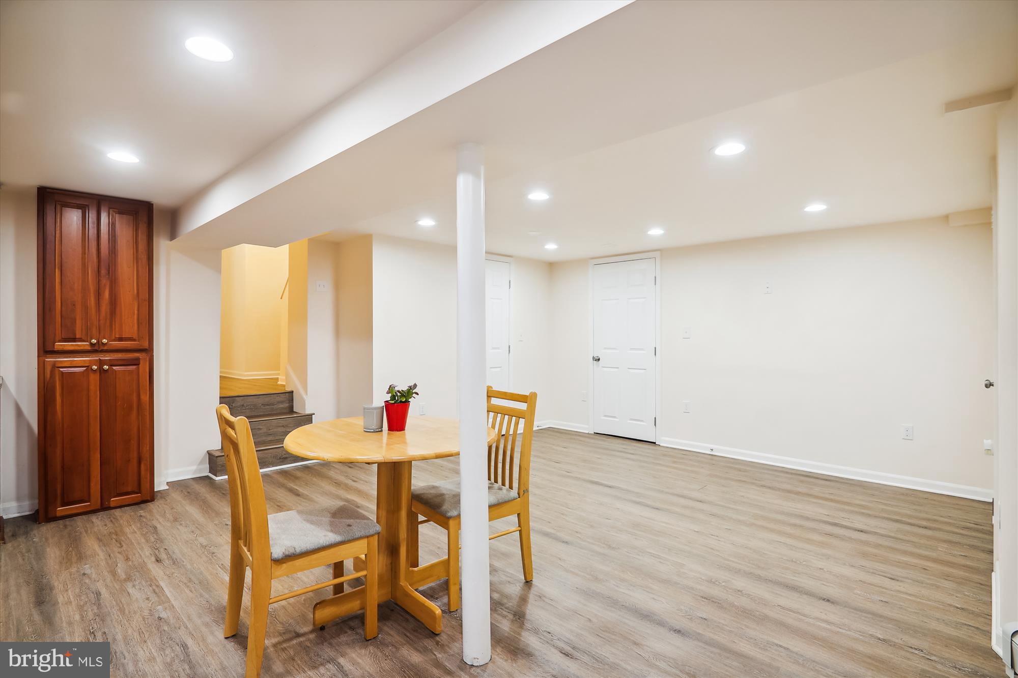 9805 Five Oaks Road Fairfax, VA 22031 - Photo 49 of 70 a dining room with furniture and wooden floor