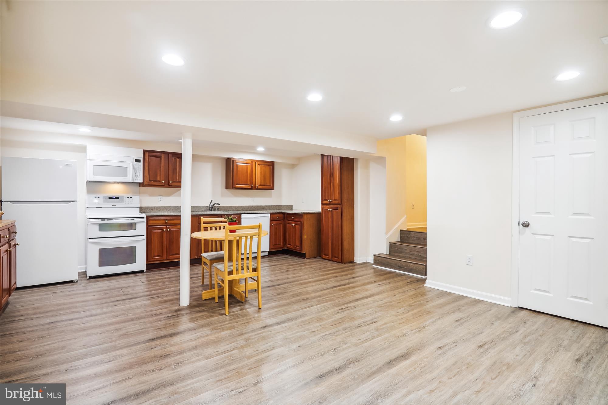 9805 Five Oaks Road Fairfax, VA 22031 - Photo 50 of 70 a view of kitchen with stainless steel appliances wooden floor and chair