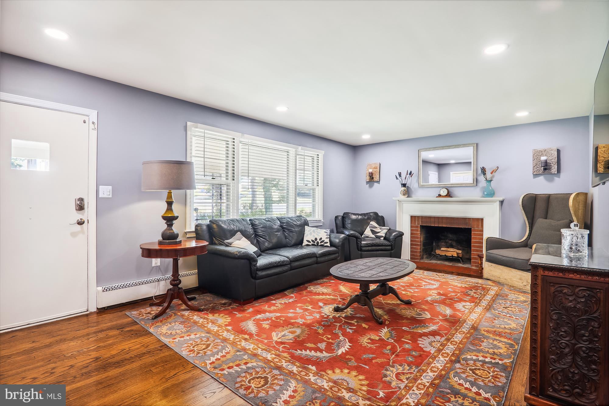 9805 Five Oaks Road Fairfax, VA 22031 - Photo 8 of 70 a living room with furniture and a fireplace