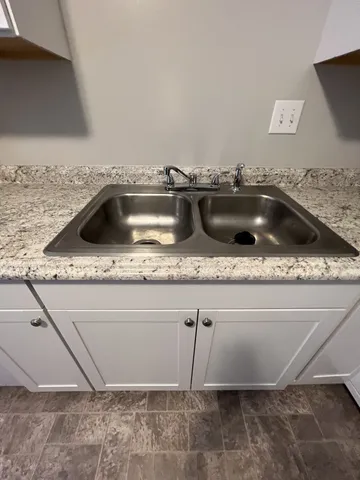 a utility room with a sink