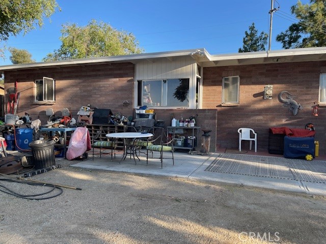 13127 East Ave W 11 Pearblossom, CA 93553 - Photo 19 of 23 a front view of a house with patio