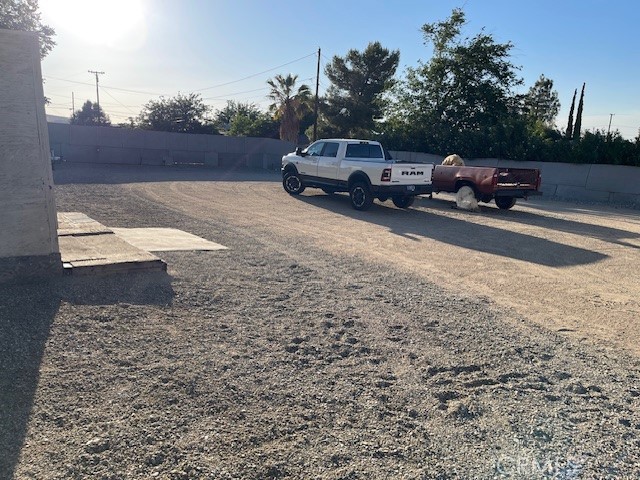 13127 East Ave W 11 Pearblossom, CA 93553 - Photo 22 of 23 a car parked on the side of the road