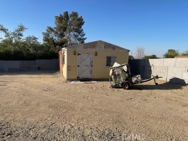 13127 East Ave W 11 Pearblossom, CA 93553 - Photo 23 of 23 a view of a barn