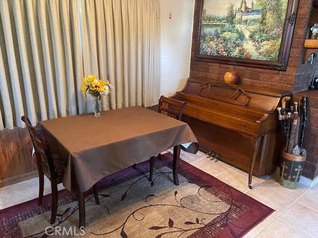 13127 East Ave W 11 Pearblossom, CA 93553 - Photo 8 of 23 a dining room with furniture and a rug