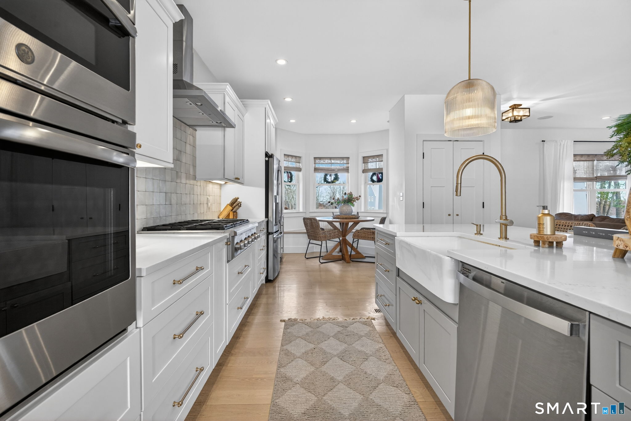 11 Ridgewood Club Road Prospect, CT 06712 - Photo 3 of 35 Gas stove, wall oven and microwave. Plenty of room for the cooks in the kitchen!