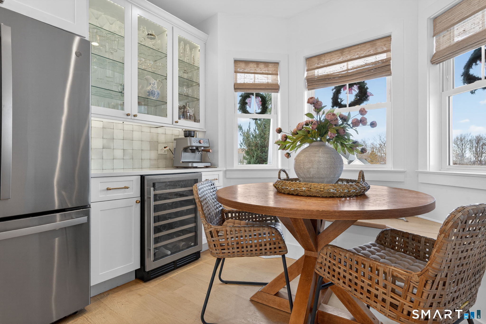 11 Ridgewood Club Road Prospect, CT 06712 - Photo 5 of 35 Beverage bar with wine refridgerator, nook with bench seating- perfect place for Sunday morning pancakes