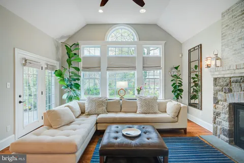 a view of a hallway with a wooden floor