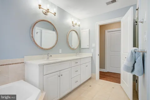 a view of a bathroom with a bathtub
