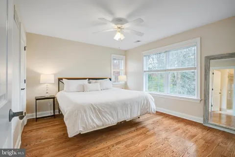 a front view of a house with a yard and porch