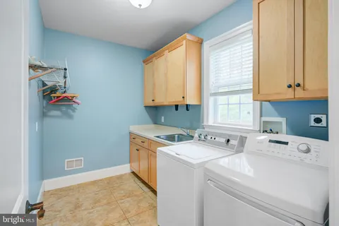 an aerial view of a house with a garden