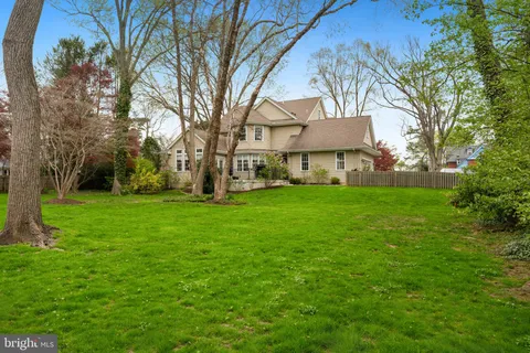 a view of street with parked cars