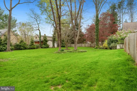 a view of a car parked in front of a building
