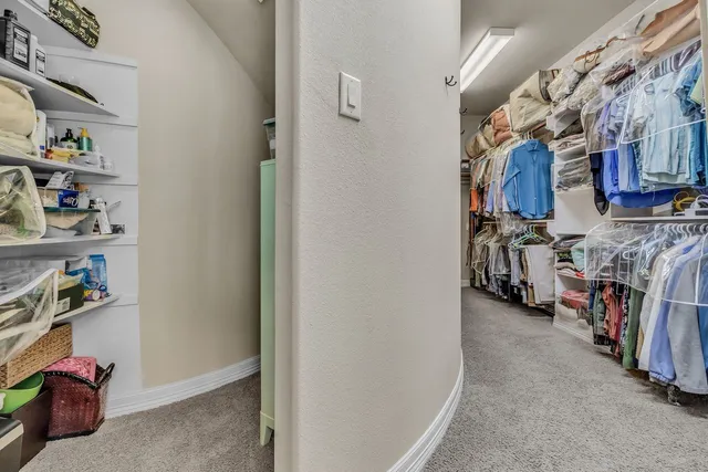 a view of a storage room with furniture