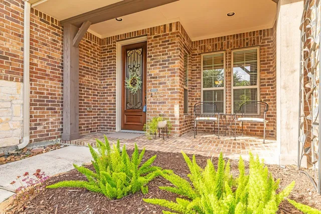 a view of a lounge chair and a window
