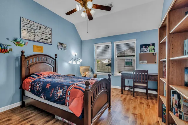 a view of a patio with a table and chairs