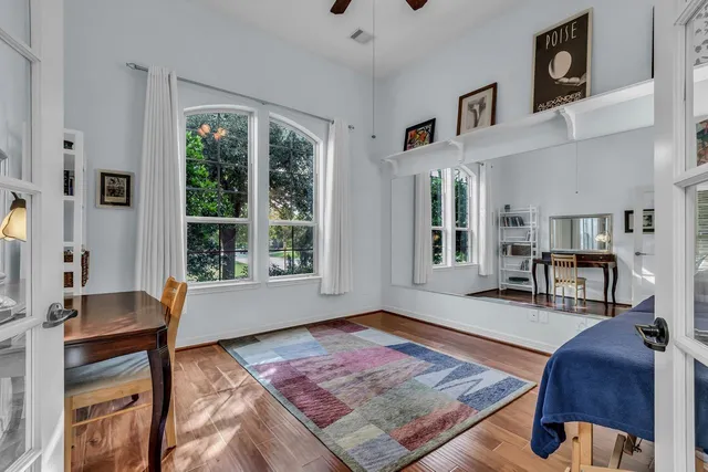 a living room with furniture and a rug