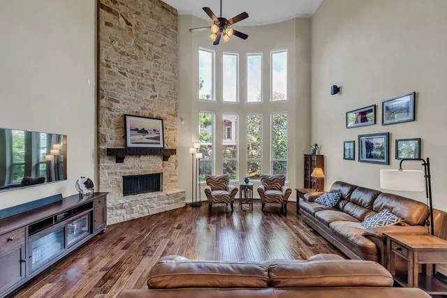 a living room with furniture or fireplace and a wooden floor