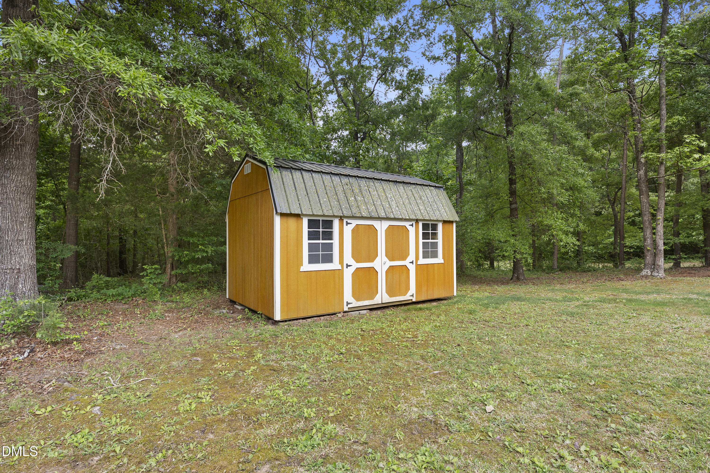 2168 Lakewood Falls Road Goldston, NC 27252 - Photo 26 of 30 a view of a backyard