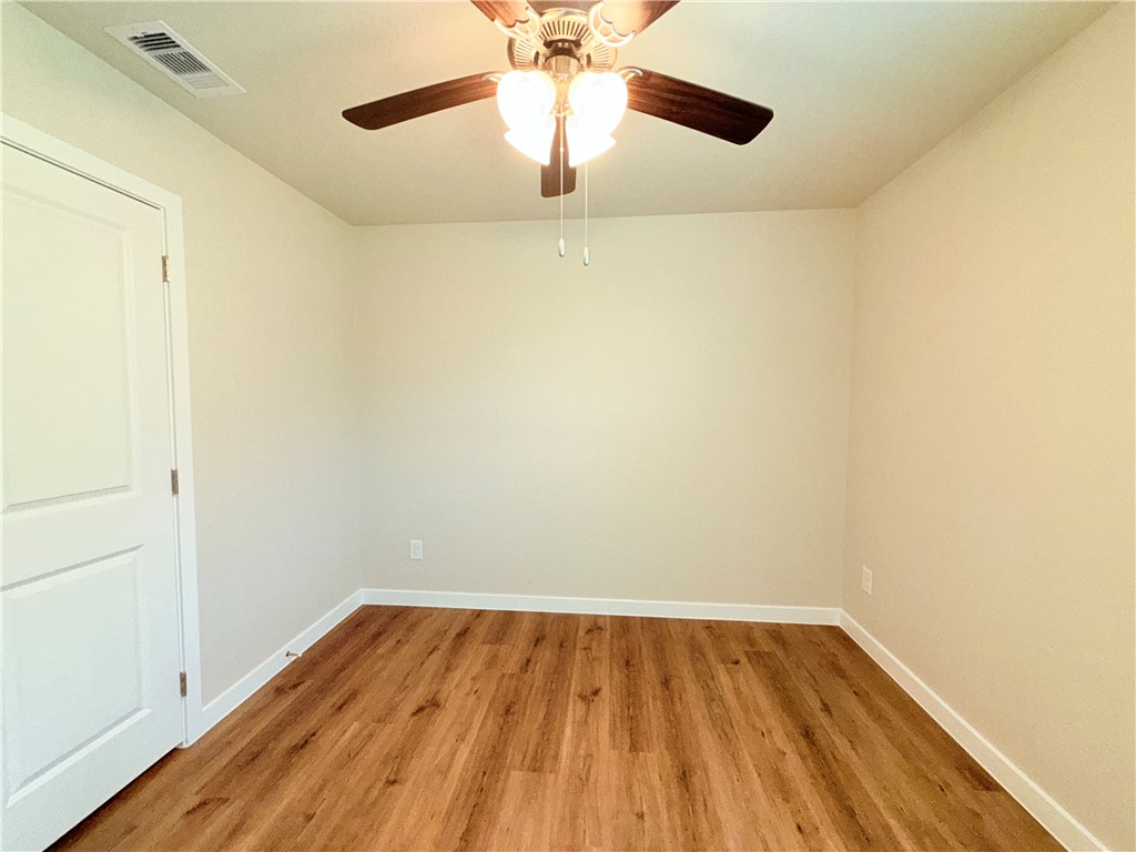 1116 Zeus Portland, TX 78374 - Photo 23 of 39 a view of an empty room with wooden floor