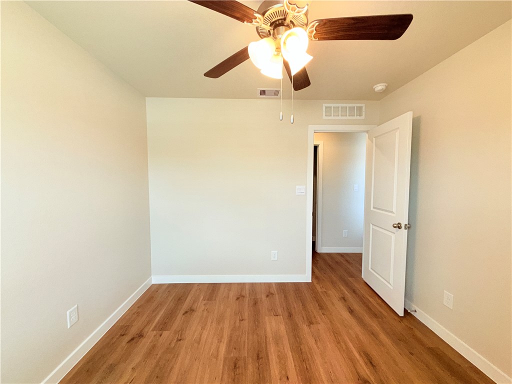 1116 Zeus Portland, TX 78374 - Photo 27 of 39 wooden floor in an empty room