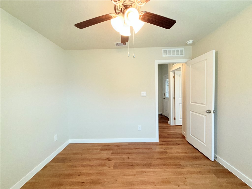 1116 Zeus Portland, TX 78374 - Photo 31 of 39 wooden floor in an empty room