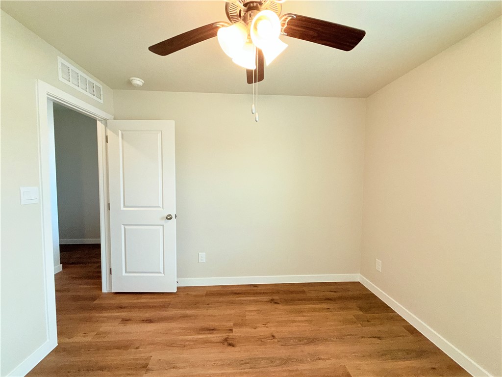 1116 Zeus Portland, TX 78374 - Photo 33 of 39 wooden floor in an empty room