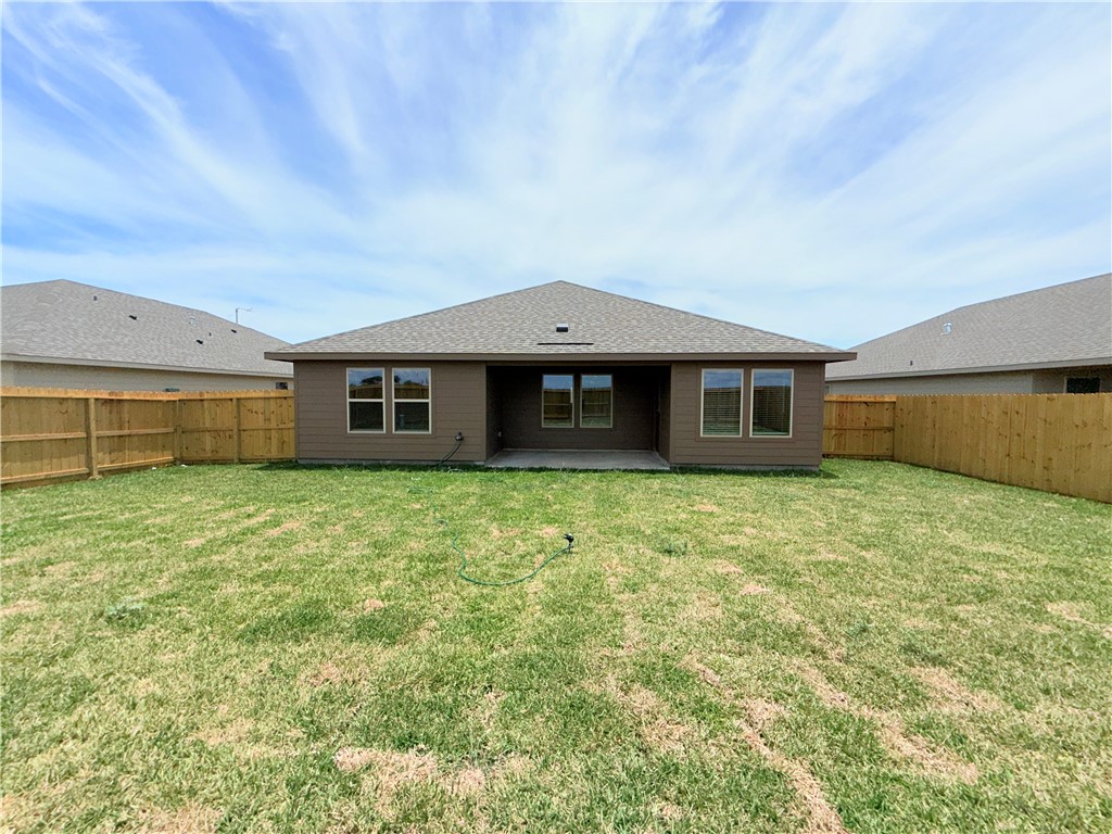 1116 Zeus Portland, TX 78374 - Photo 39 of 39 a front view of a house with a garden