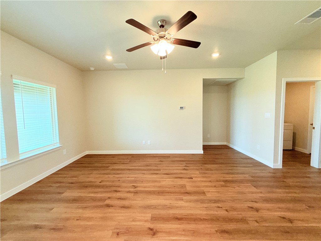 1116 Zeus Portland, TX 78374 - Photo 4 of 39 an empty room with fan and windows
